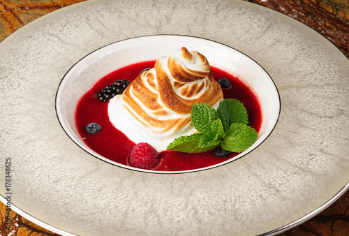 Meringue dessert with berries photo