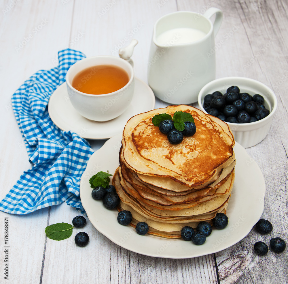 Plate with pancakes and blueberries Plate with pancakes and blueberries