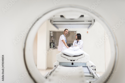 Two doctors at MRI scanner