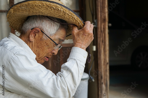 Elderly man planting a garden