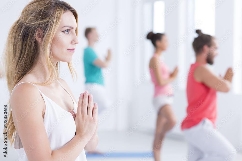 Woman enjoying yoga exercises Woman enjoying yoga exercises