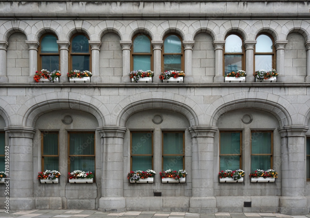Fototapeta premium Stone building with multiple identical arched windows