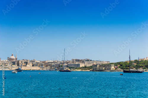 Mediterranean traditional colorful boats in Malta © ilolab