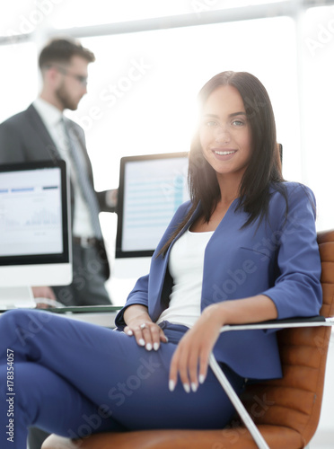 Beautiful businesswoman on the background of business people