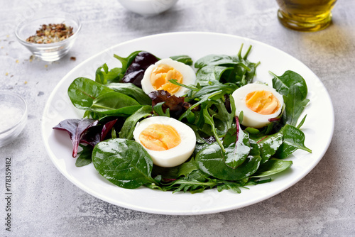 Vegetarian salad with greens and eggs