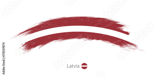 Cuadro en lienzo Flag of Latvia in rounded grunge brush stroke.