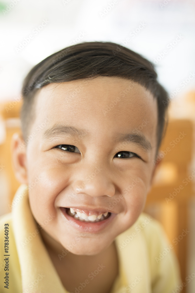 toothy smiling face happiness emotion of asian children shallow depth of field toothy smiling face happiness emotion of asian children shallow depth of field