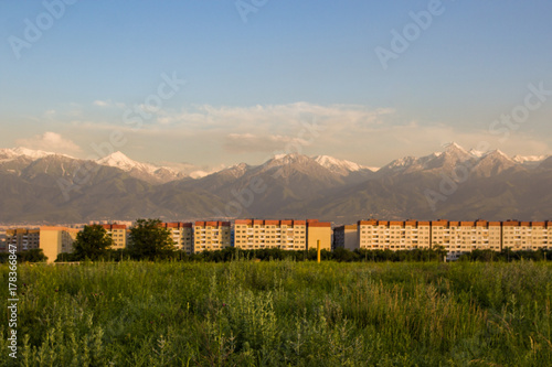 Almaty city panoramic view, Kazakhstan. Cloudy sky, mountains