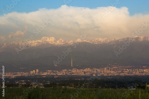 Almaty city panoramic view, Kazakhstan. Cloudy sky, mountains