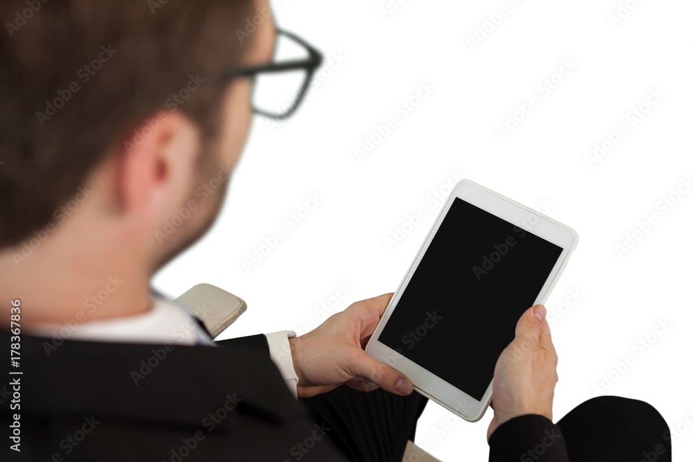 High angle view of businessman using digital tablet High angle view of businessman using digital tablet