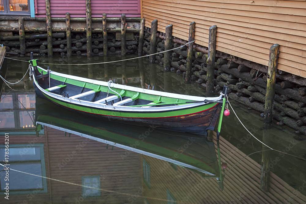Docked Boat in a small Harbor in Bergen, Norway
