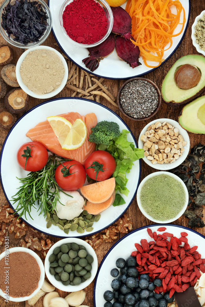 Brain health food concept with fish, vegetables, seeds, nuts, berry fruit, herbs, supplement powders and tablets. Foods high in omega 3 fatty acids, vitamins, minerals, antioxidants and anthocyanins. Brain health food concept with fish, vegetables, seeds, nuts, berry fruit, herbs, supplement powders and tablets. Foods high in omega 3 fatty acids, vitamins, minerals, antioxidants and anthocyanins.