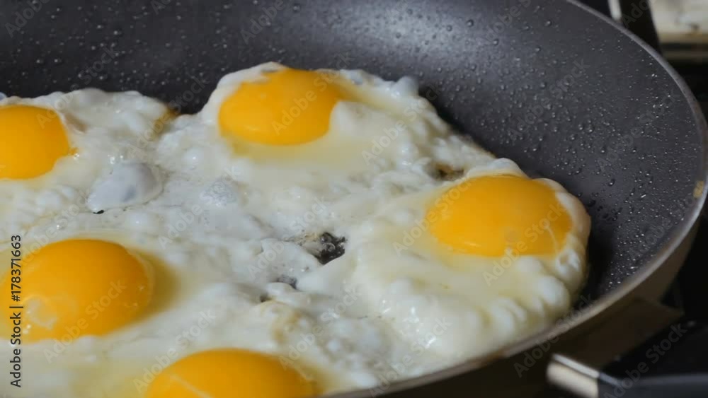 Scrambled eggs on hot frying pan Scrambled eggs on hot frying pan