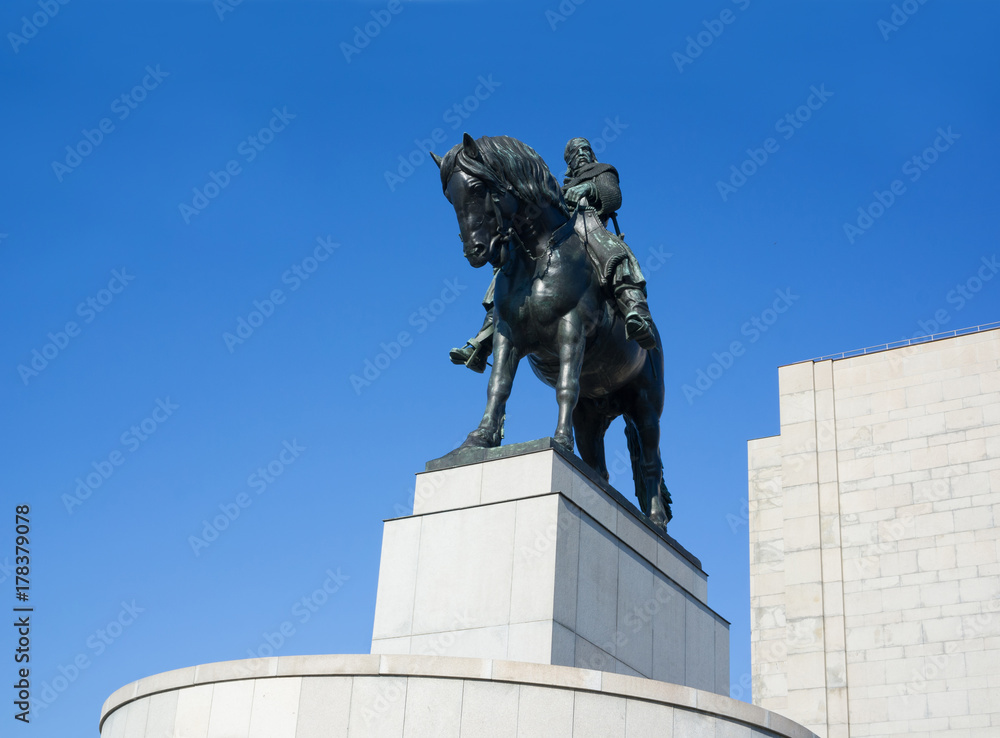 Obraz premium National memorial on Vitkov hill, Zizkov, Prague, Czech Republic / Czechia - Equestrian statue of Jan Zizka, legend, famous hero and medieval warrior. Bronze sculpture of rider and horse on pedestal 