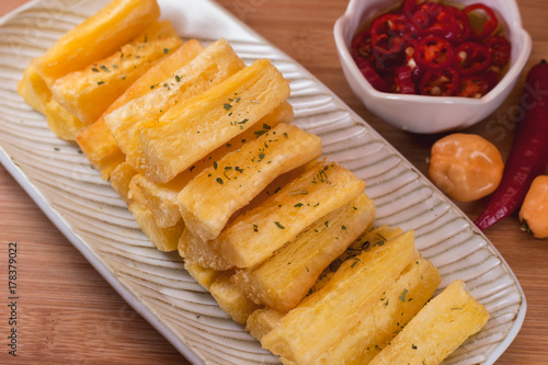 Deep fried cassava root. Brazilian food mandioca frita. photo