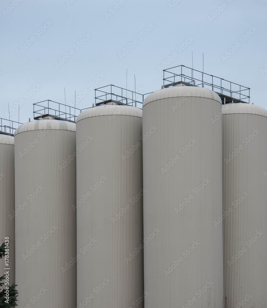 Production. Industrial buildings in the blue sky
