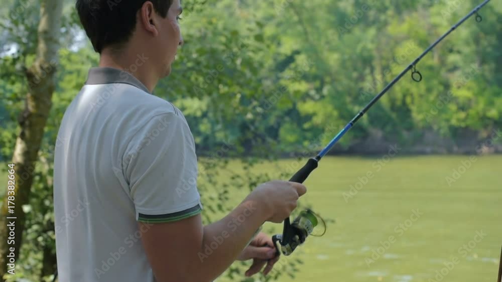 man fishing in river man fishing in river