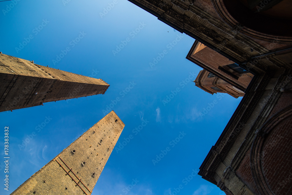 BOLOGNA, ITALY - October, 2017: Two famous falling towers Asinelli and Garisenda in the morning, Bologna, Emilia-Romagna, Italy