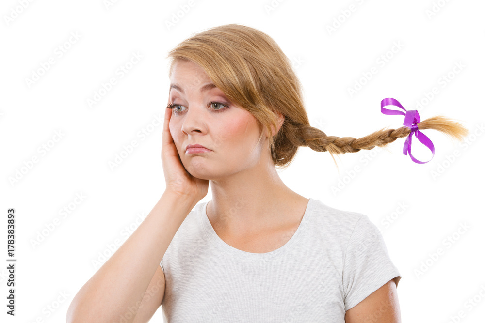 Sad teenage girl in windblown braid hair Sad teenage girl in windblown braid hair