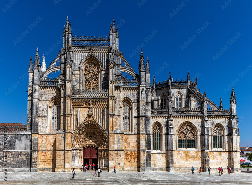 Details of the facade of the 14th century Batalha Monastery in Batalha, Portugal, a prime example of Portuguese Gothic architecture, UNESCO World Heritage site.