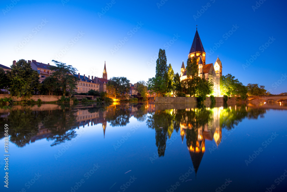 View of Metz with Temple Neuf reflected in the Moselle River, Lorraine, France