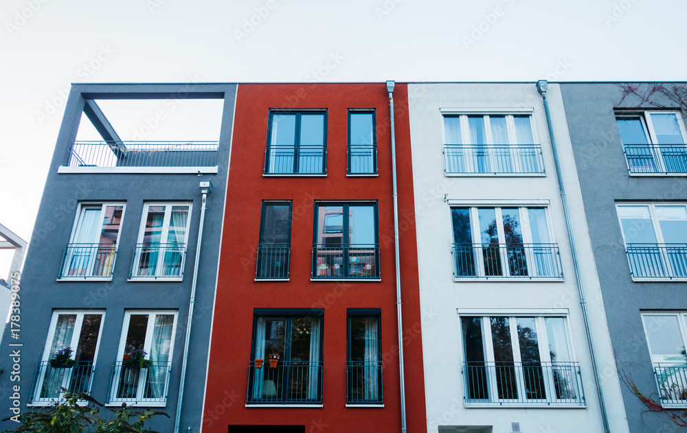 Obraz premium cold colored townhouses in a row
