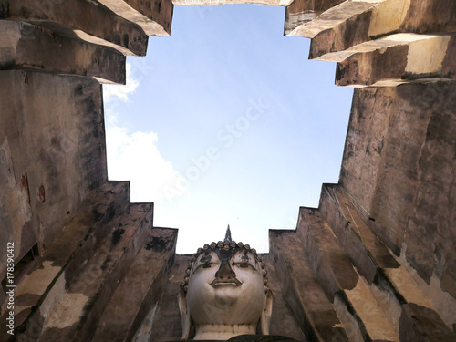 The art of the old Buddha building at Sukhothai historical park in Thailand. This building is the favorite for visit as this is the part of the old capital in Thailand. This place is wat Srichum photo