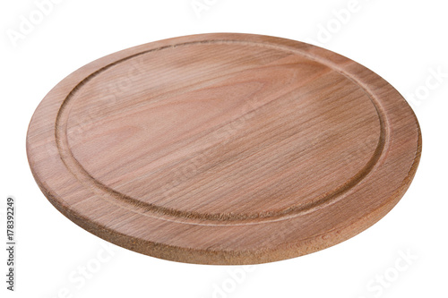 round wooden cutting board on white background, beech tree