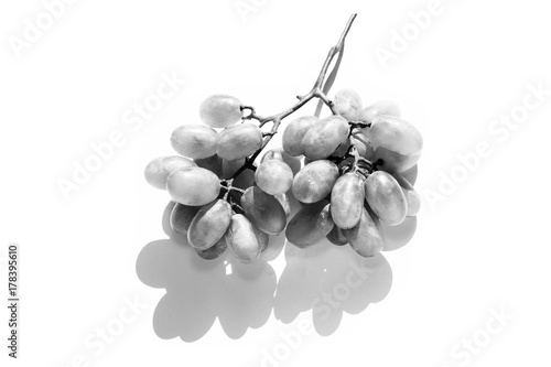 Fresh green grape on black and white