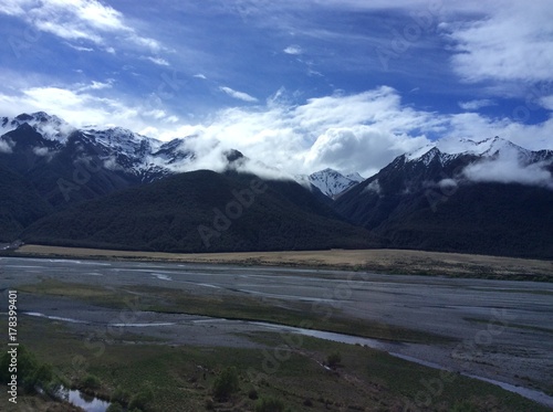 Snow peak mountains and clouds in newzealand © Rachit