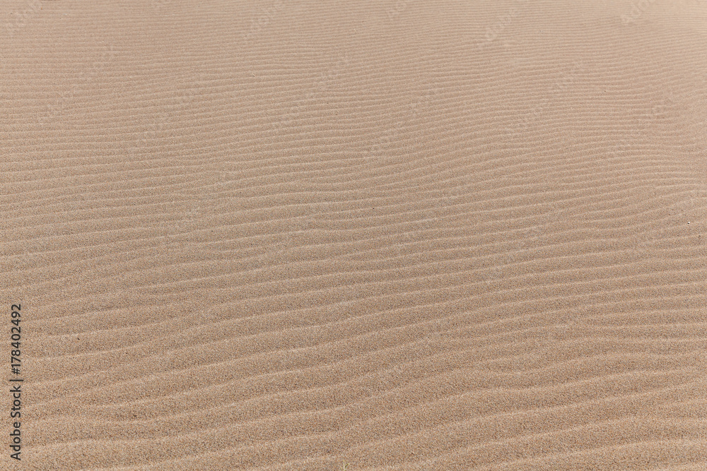 Obraz premium Yellow sand texture for background