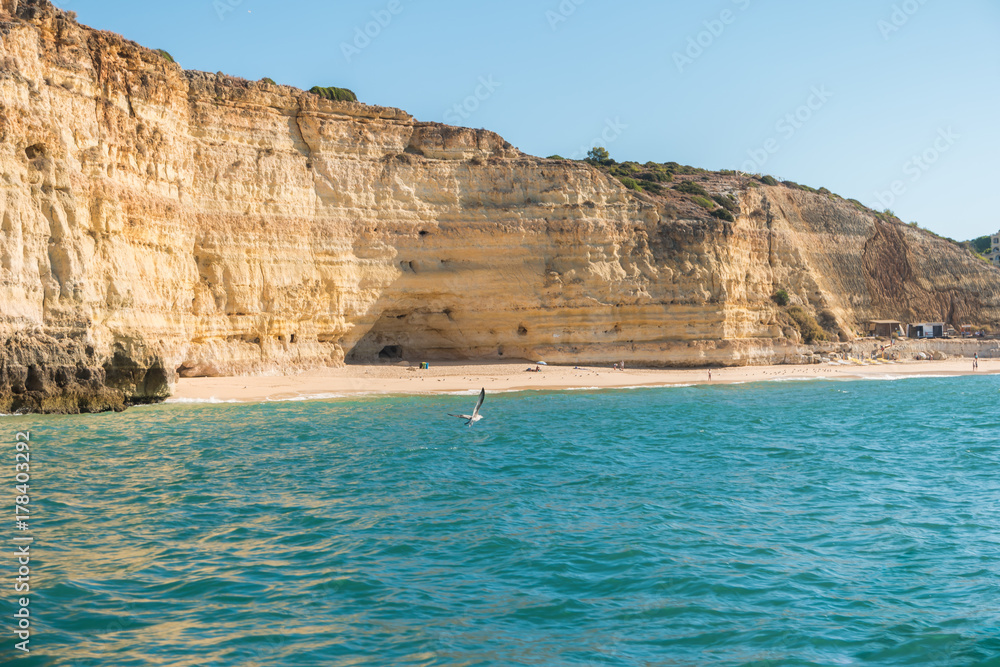 Scenic golden cliffs near Benagil, Lagoa, Algarve