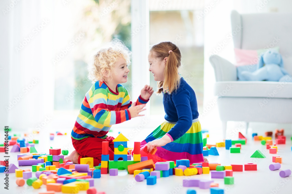 Kids play with toy blocks. Toys for children. Kids play with toy blocks. Toys for children.