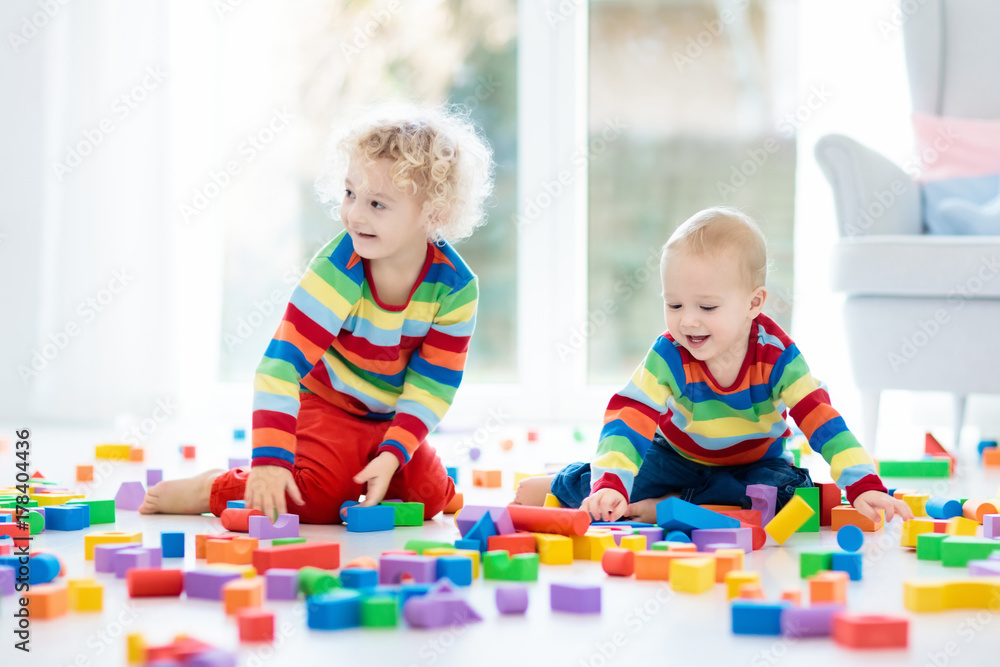 Kids play with toy blocks. Toys for children. Kids play with toy blocks. Toys for children.