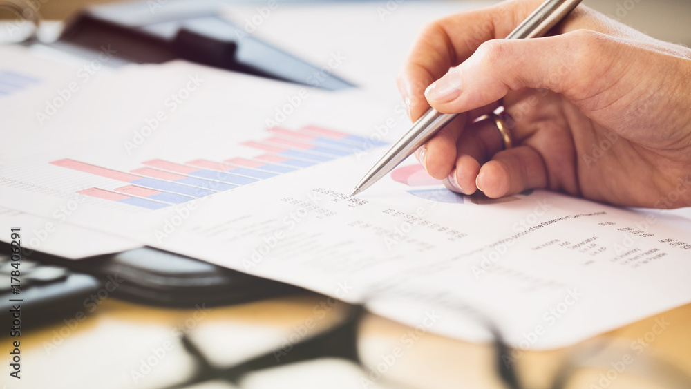Hand Checking Financial Documents Hand Checking Financial Documents