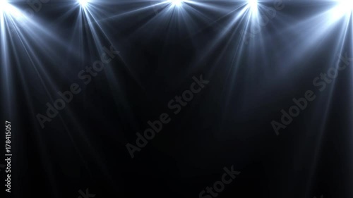 spotlights lighting flare animation on a dark background, abstract 