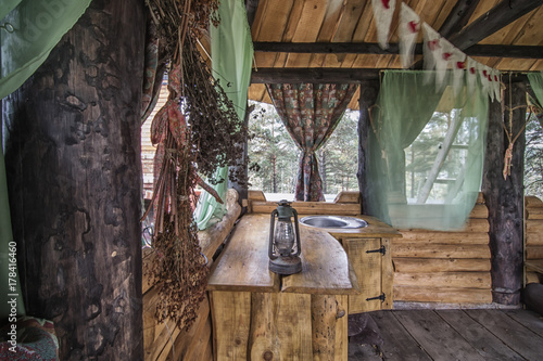 Obraz na płótnie Rural kitchen in wooden gazebo w salonie