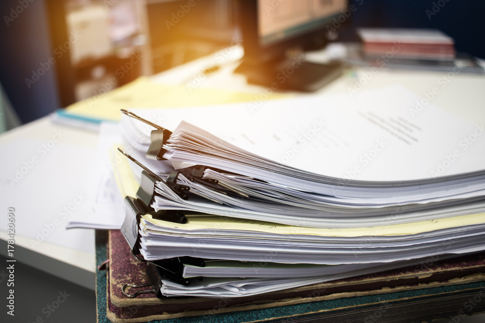 Unfinished documents stacks of paper files on office desk for report papers, piles of unfinish papers sheet achieves with clips indoor, Business offices concept. Document is written, drawn,presented. Unfinished documents stacks of paper files on office desk for report papers, piles of unfinish papers sheet achieves with clips indoor, Business offices concept. Document is written, drawn,presented.