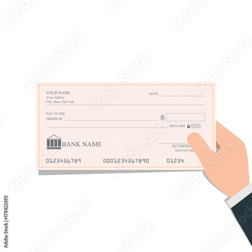 Businessman holding blank bank checks or cheque book on colored.