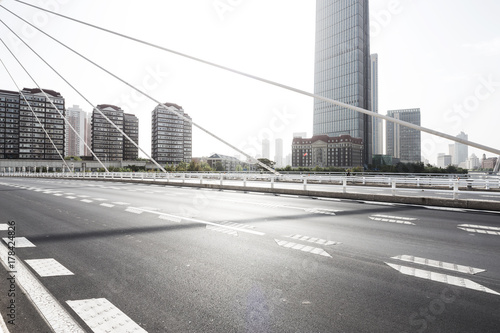 empty asphalt road on modern bridge