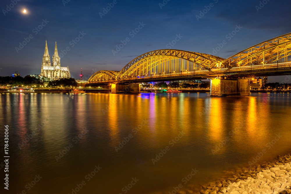 Cologne Cathedral and Hohenzollern Bridge at night, Germany Cologne Cathedral and Hohenzollern Bridge at night, Germany
