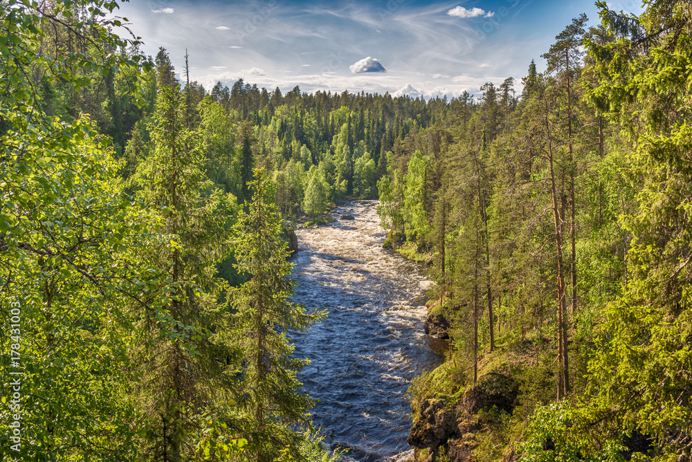 Wild river flowing in Lapland,Finland.
Wild river flowing in Lapland,Finland.
