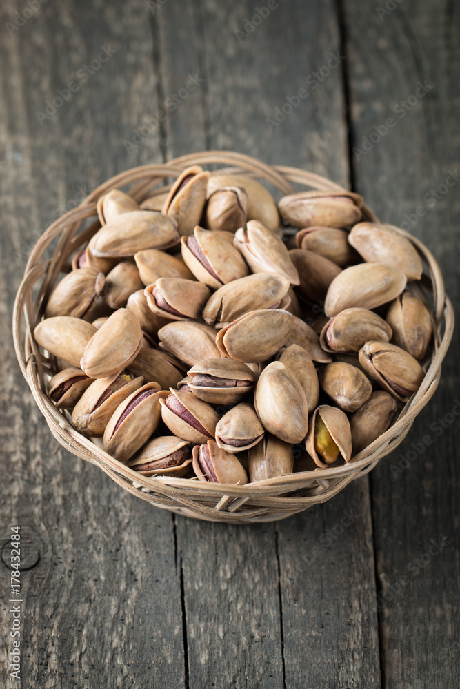 Healthy mix nuts on wooden background. Almonds, hazelnuts, cashews, peanuts, pistachios, brazilian nuts Healthy mix nuts on wooden background. Almonds, hazelnuts, cashews, peanuts, pistachios, brazilian nuts