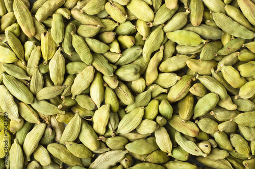 cardamom seeds spice as a background, natural seasoning texture