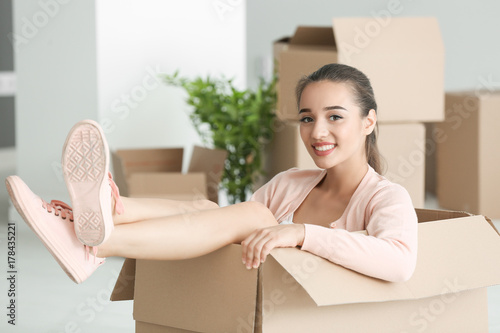 Happy young woman having fu...