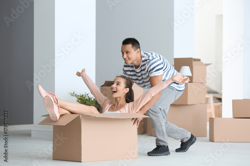 Happy young couple having f...