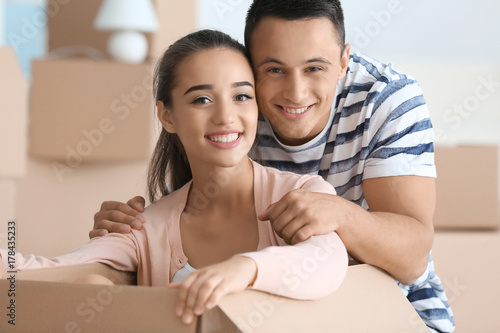 Happy young couple having f...