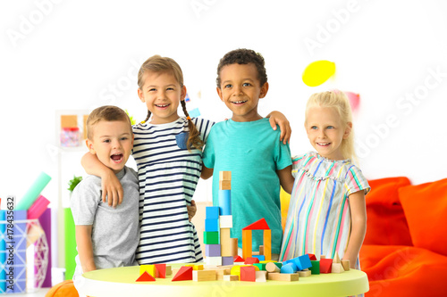 Cute children playing with ...
