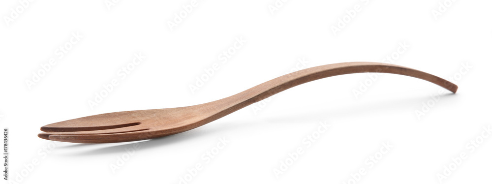 Wooden fork on white background Wooden fork on white background