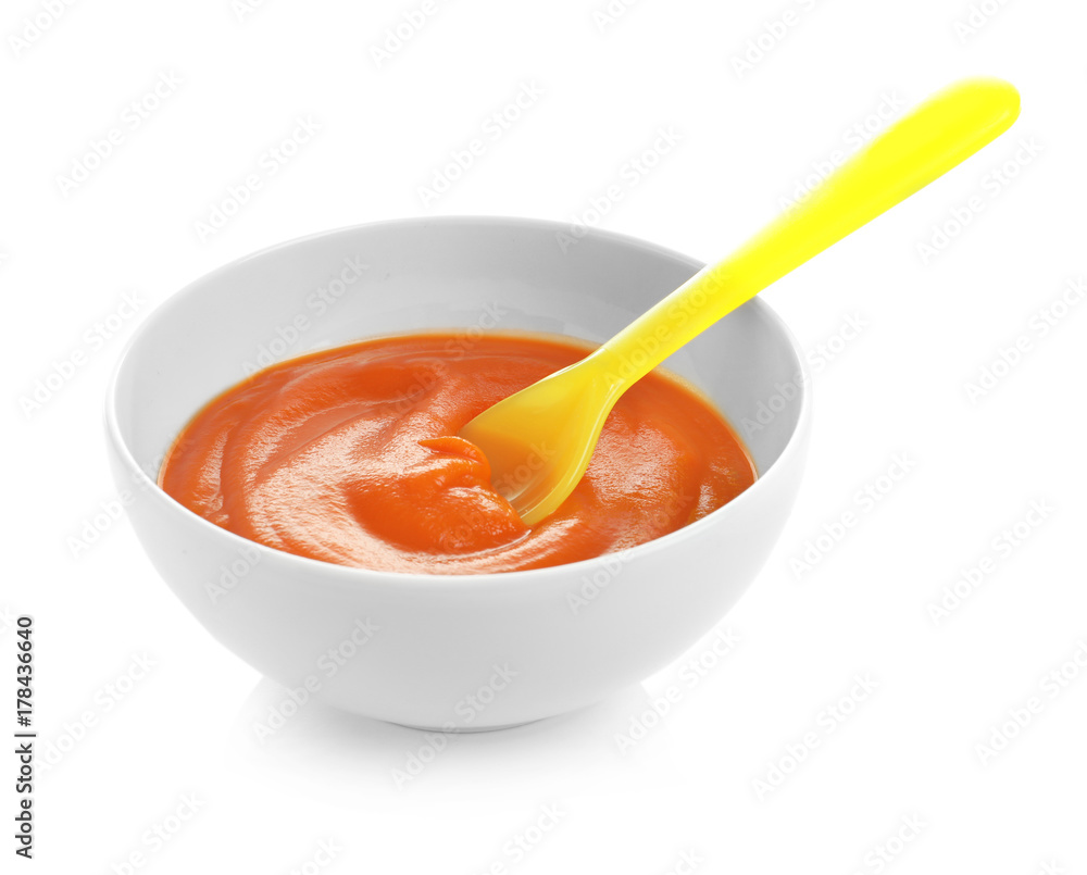 Bowl with baby food on white background Bowl with baby food on white background